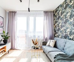 Suite Deluxe, vistas a la ciudad | Zona de estar