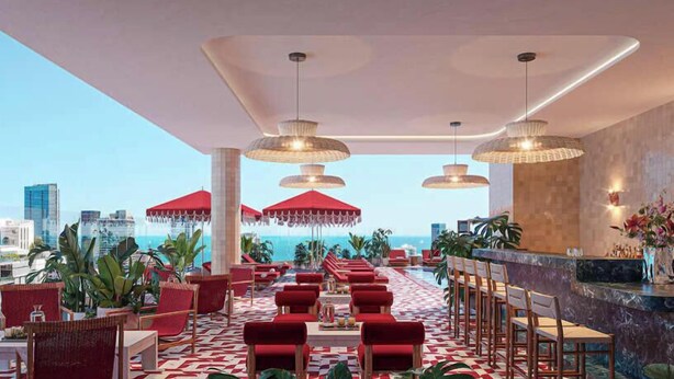 A rooftop bar with red chairs, a checkered floor, and a city view. - Heart of Brickell - Near Downtown (Miami)