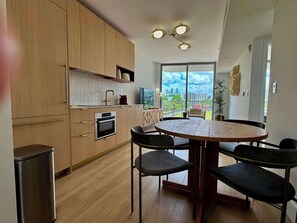 Deluxe-huoneisto, kaupunkinäköala | Ruokasali