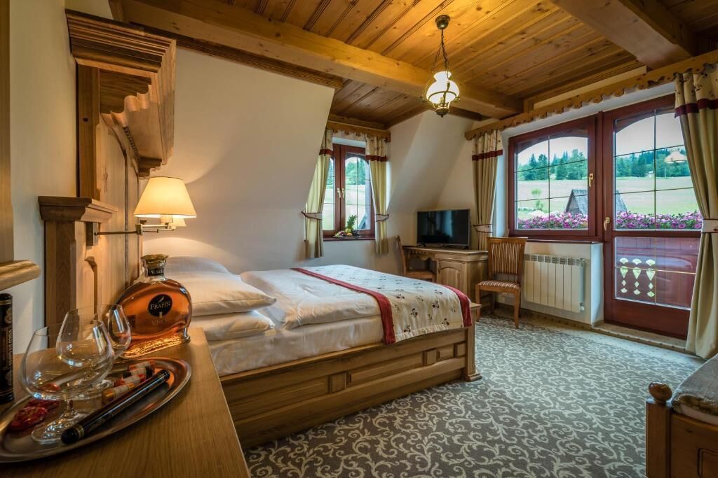 Triple Room, Balcony, Courtyard View | In-room safe, desk, laptop workspace, blackout curtains