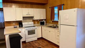 Coffee/tea maker, microwave, cookware/dishes/utensils