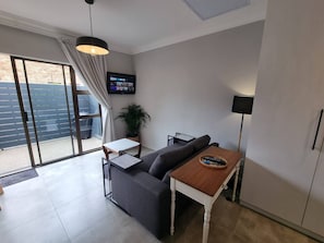 Studio, 1 Schlafzimmer, Balkon | Wohnzimmer