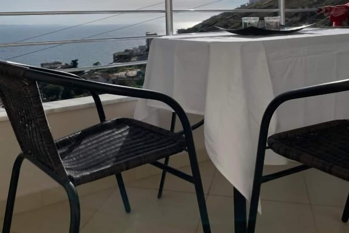 Family Apartment, Balcony, City View | Outdoor dining