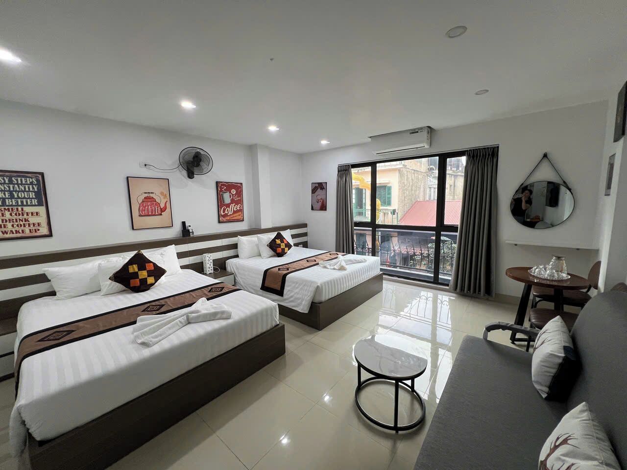 Habitación cuádruple Deluxe, vista a la ciudad