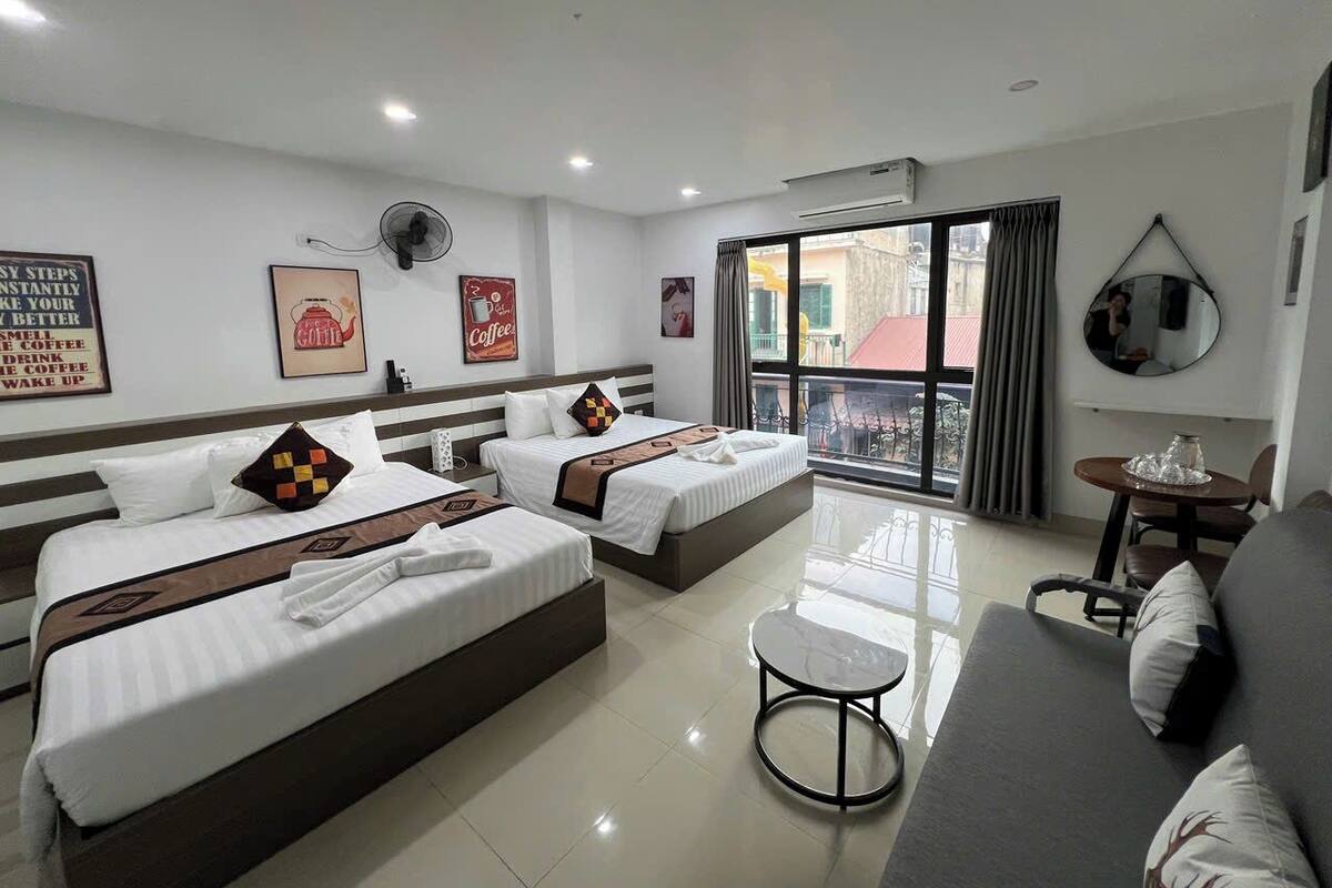 Habitación cuádruple Deluxe, vista a la ciudad