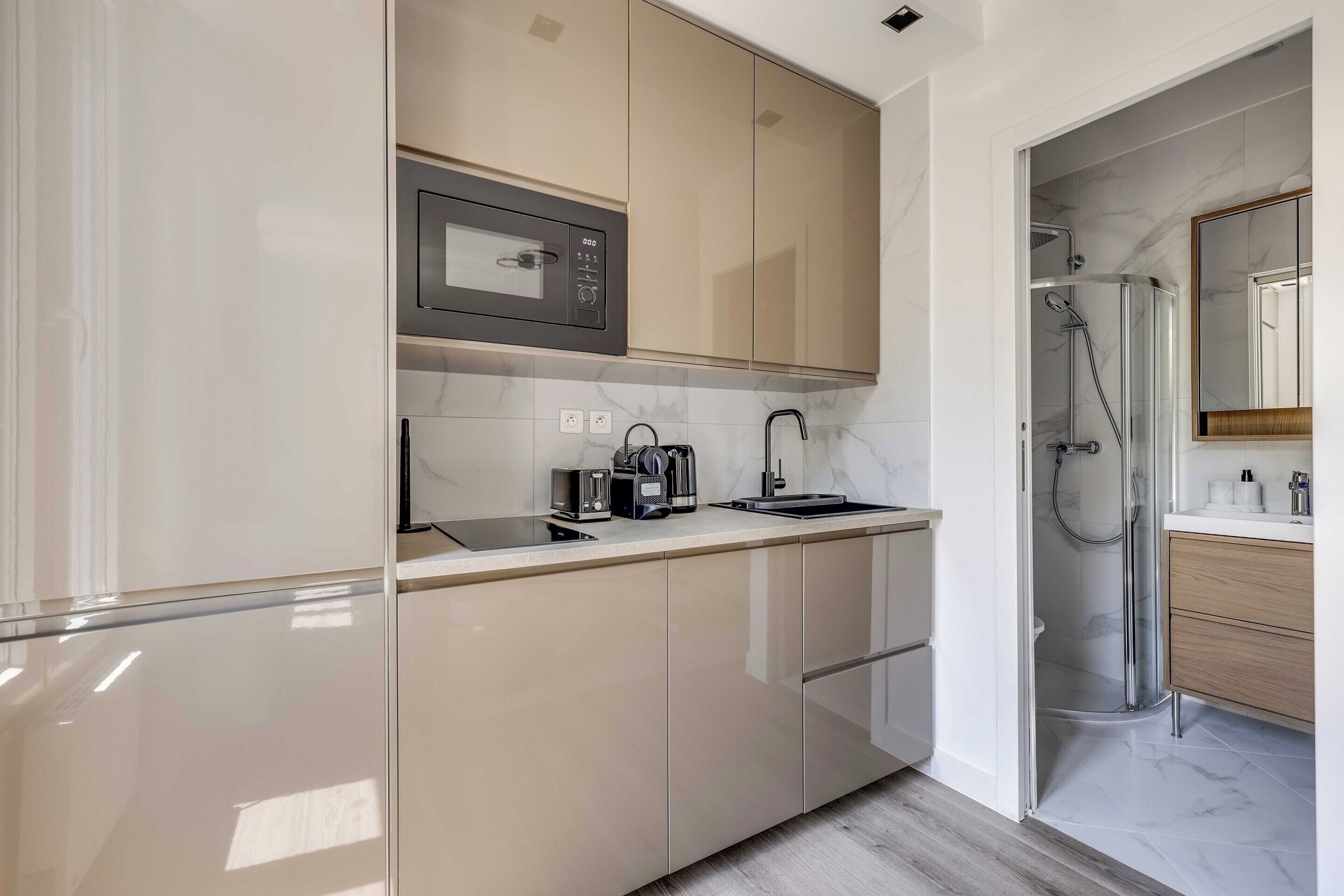 Apartment | Private kitchen | Fridge, microwave, stovetop, dishwasher