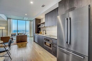 Fridge, microwave, oven, stovetop - 23rd floor corner condo w/scenic sunset & lake-view balcony - rooftop pool & gym (Austin)