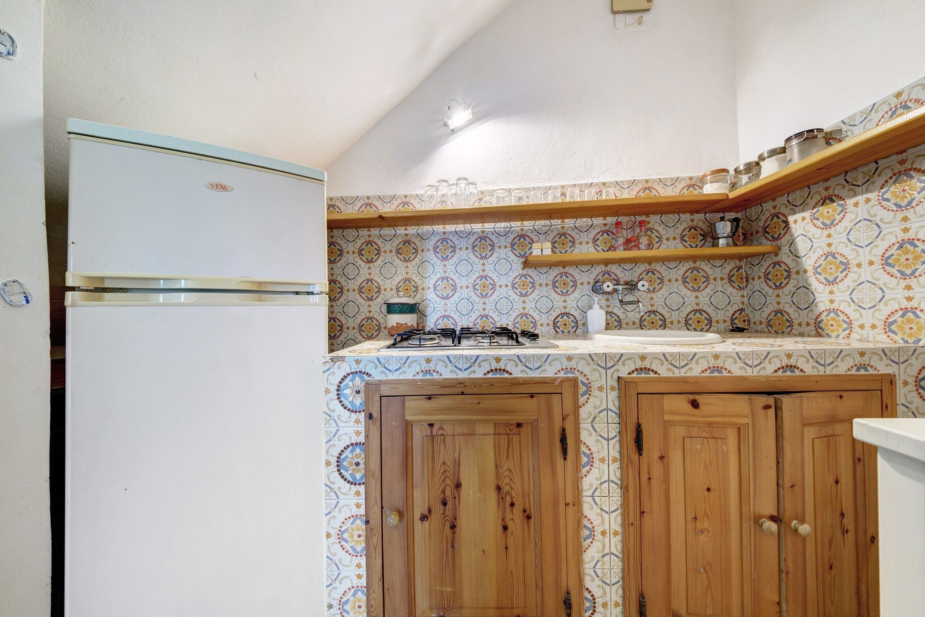 Fridge, stovetop, cookware/dishes/utensils