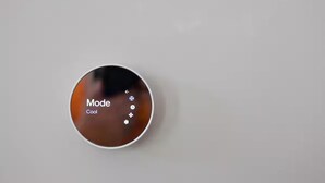 Eine runde Benutzeroberfläche mit dem Text 'Mode Cool' und verschiedenen Symbolen.