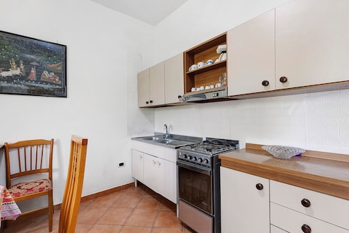 Room 'Matrimoniale Con Letto Singolo' with Shared Garden and Wi-Fi