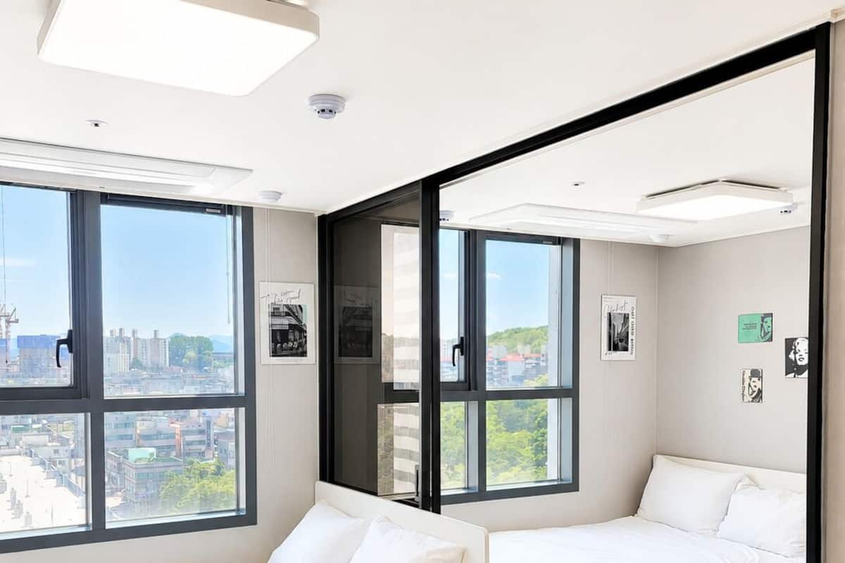 Deluxe Twin Room, 2 Queen Beds, Non Smoking | Pillowtop beds, individually furnished, soundproofing, free WiFi