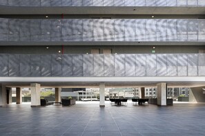 Lobby sitting area - Mountain Views with Rooftop Pool and Gym (Santa Catarina)