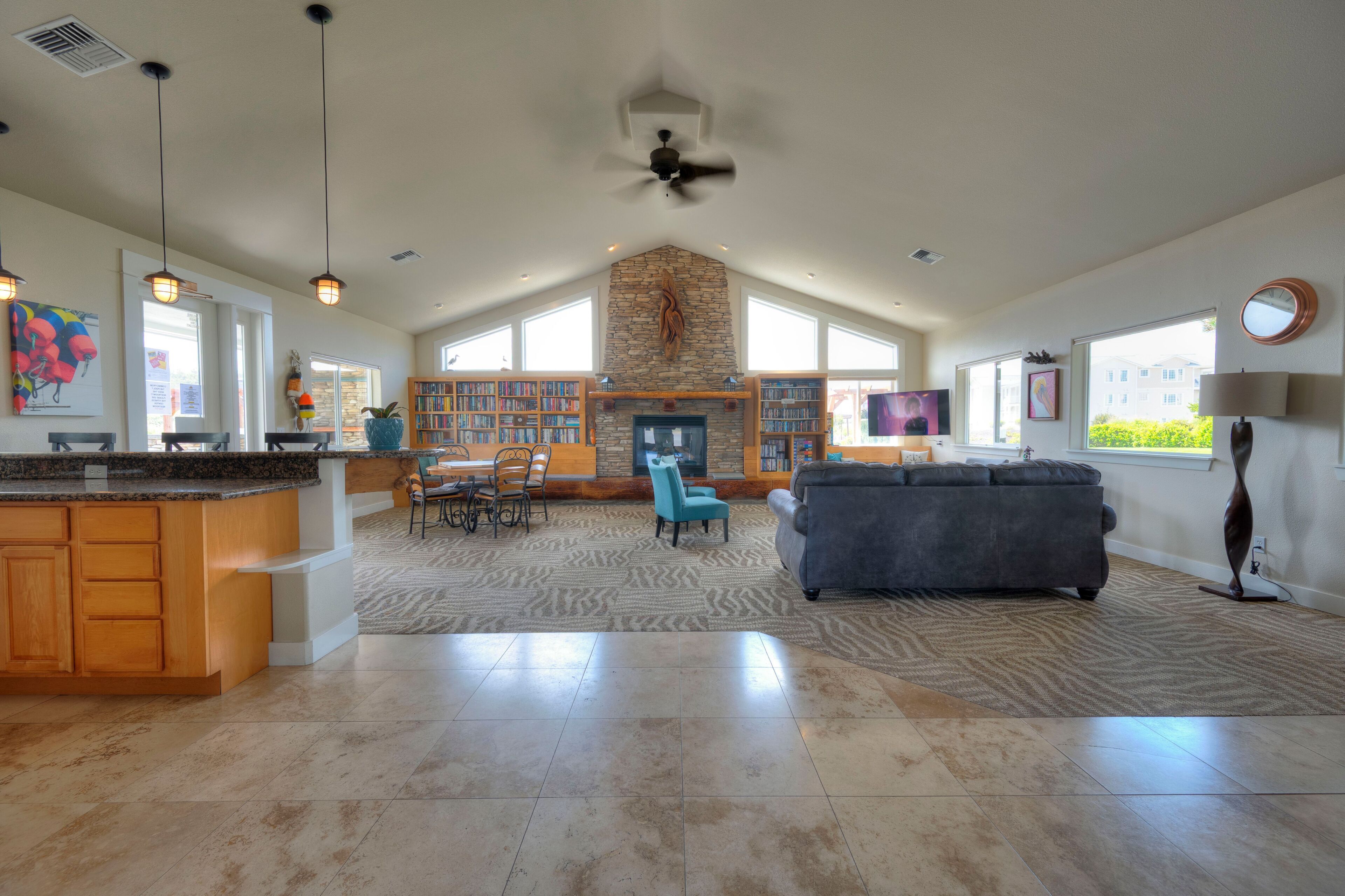 TV, fireplace, books