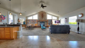 TV, fireplace, books