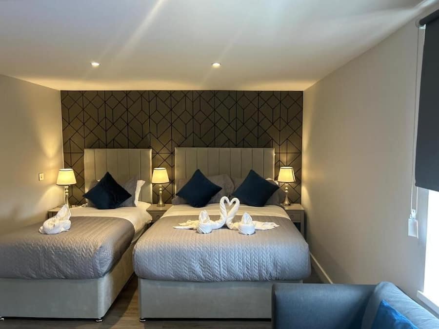 Family Studio | In-room safe, iron/ironing board (on request), WiFi (free), bed sheets