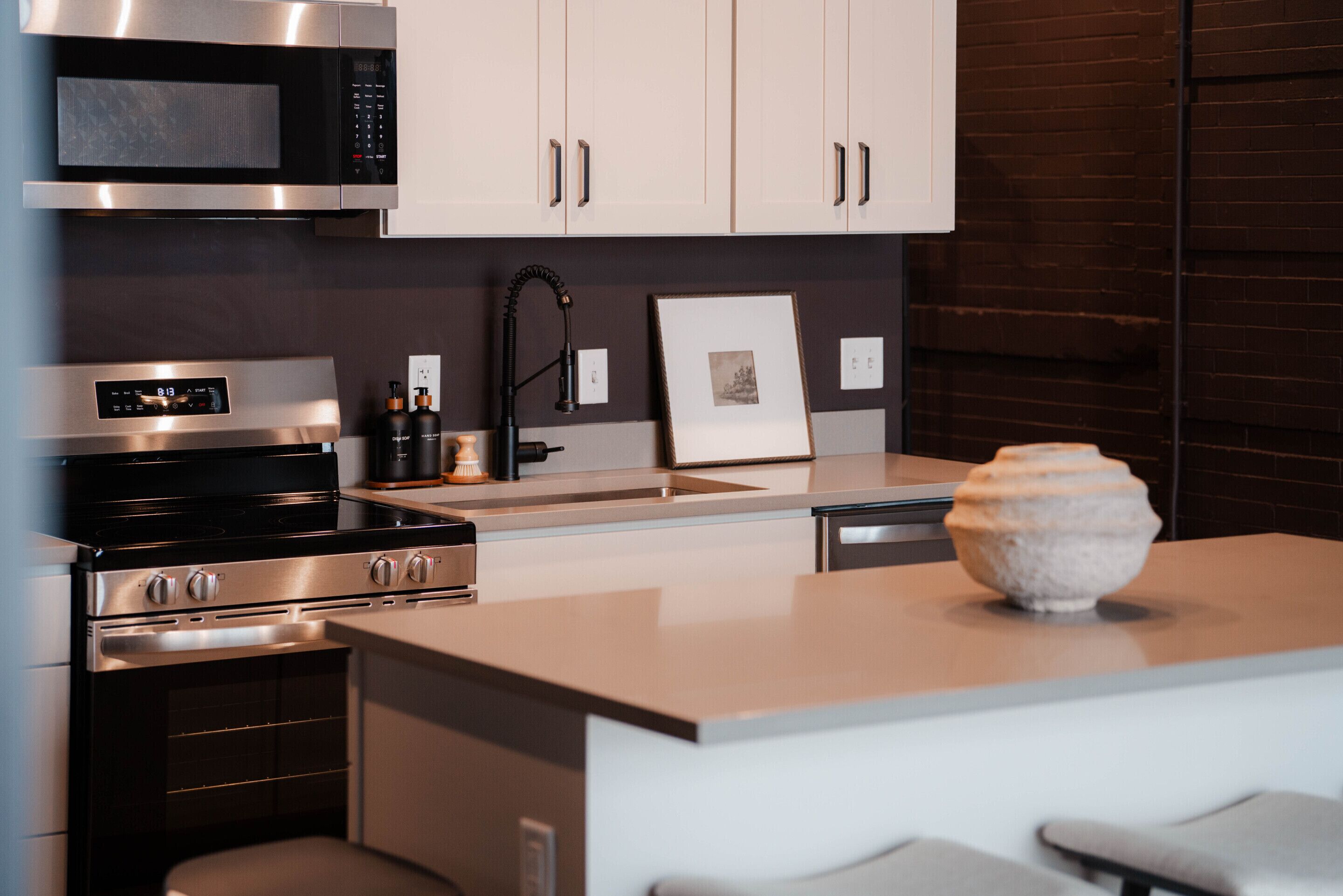Coffee/tea maker, fridge, microwave, oven
