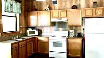 Coffee/tea maker, microwave, cookware/dishes/utensils