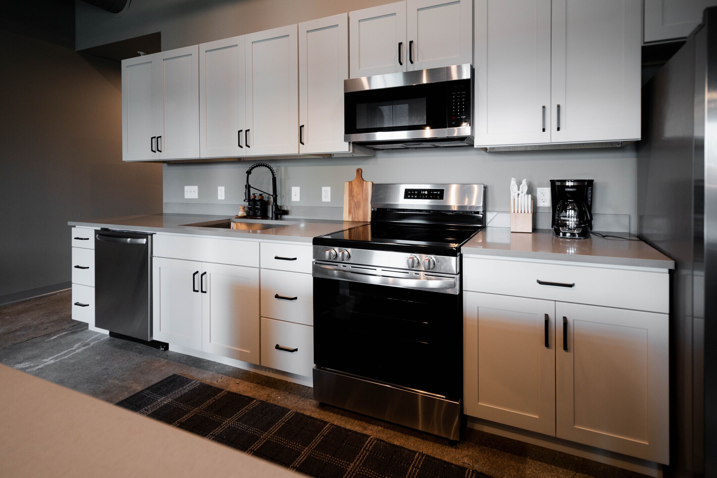 Coffee/tea maker, fridge, microwave, oven