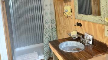 Hair dryer, towels, soap, shampoo