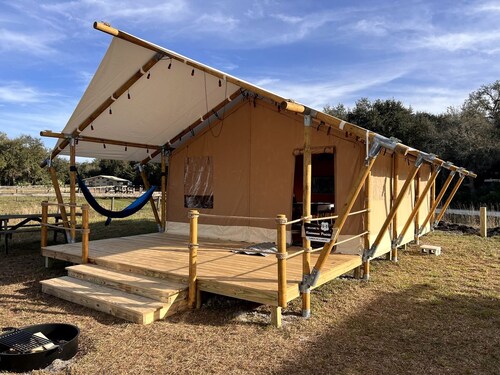Deluxe Safari Tent with Fire Pit, Hammocks & BBQ in Basinger, Florida