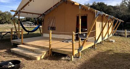 Deluxe Safari Tent with Fire Pit, Hammocks & BBQ in Basinger, Florida