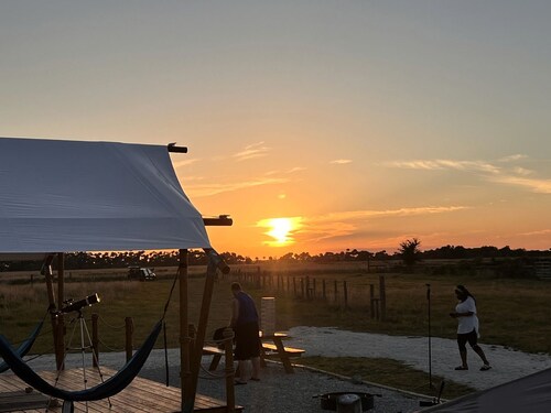 Glamping Safari Tent with Fire Pit & Relaxing Hammocks in Basinger, Florida