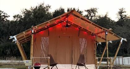 Glamping Safari Tent with Fire Pit & Relaxing Hammocks in Basinger, Florida