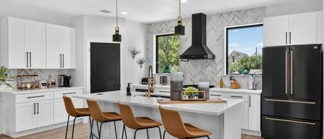 Coffee/tea maker, fridge, microwave, oven