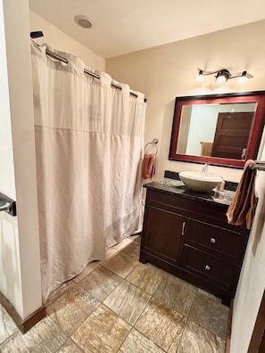 Jetted bath, towels, soap, toilet paper