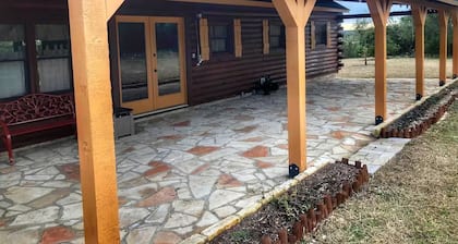 Peaceful and Pet Friendly Log Cabin near Medina Lake, Perfect for a Texas Hill Country Getaway