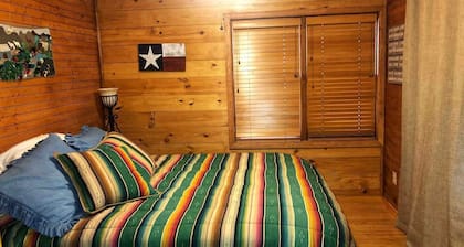 Peaceful and Pet Friendly Log Cabin near Medina Lake, Perfect for a Texas Hill Country Getaway