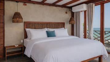 Superior Suite, Balcony, Partial Sea View | In-room safe, desk, laptop workspace, blackout curtains