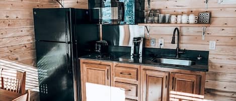 Fridge, microwave, coffee/tea maker, toaster