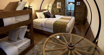 Rustic Covered Glamping Wagons with Modern Comforts Near Wall Drug – Wall, South Dakota