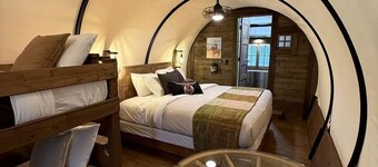 Rustic Covered Glamping Wagons with Modern Comforts Near Wall Drug – Wall, South Dakota