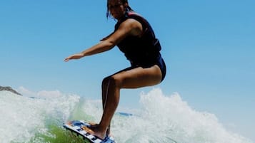 A person surfing on a wave.