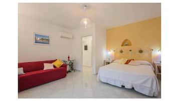 Family Apartment, Balcony, City View | Premium bedding, down comforters, laptop workspace, blackout drapes