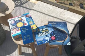 A table with educational books on astronomy and space exploration.
