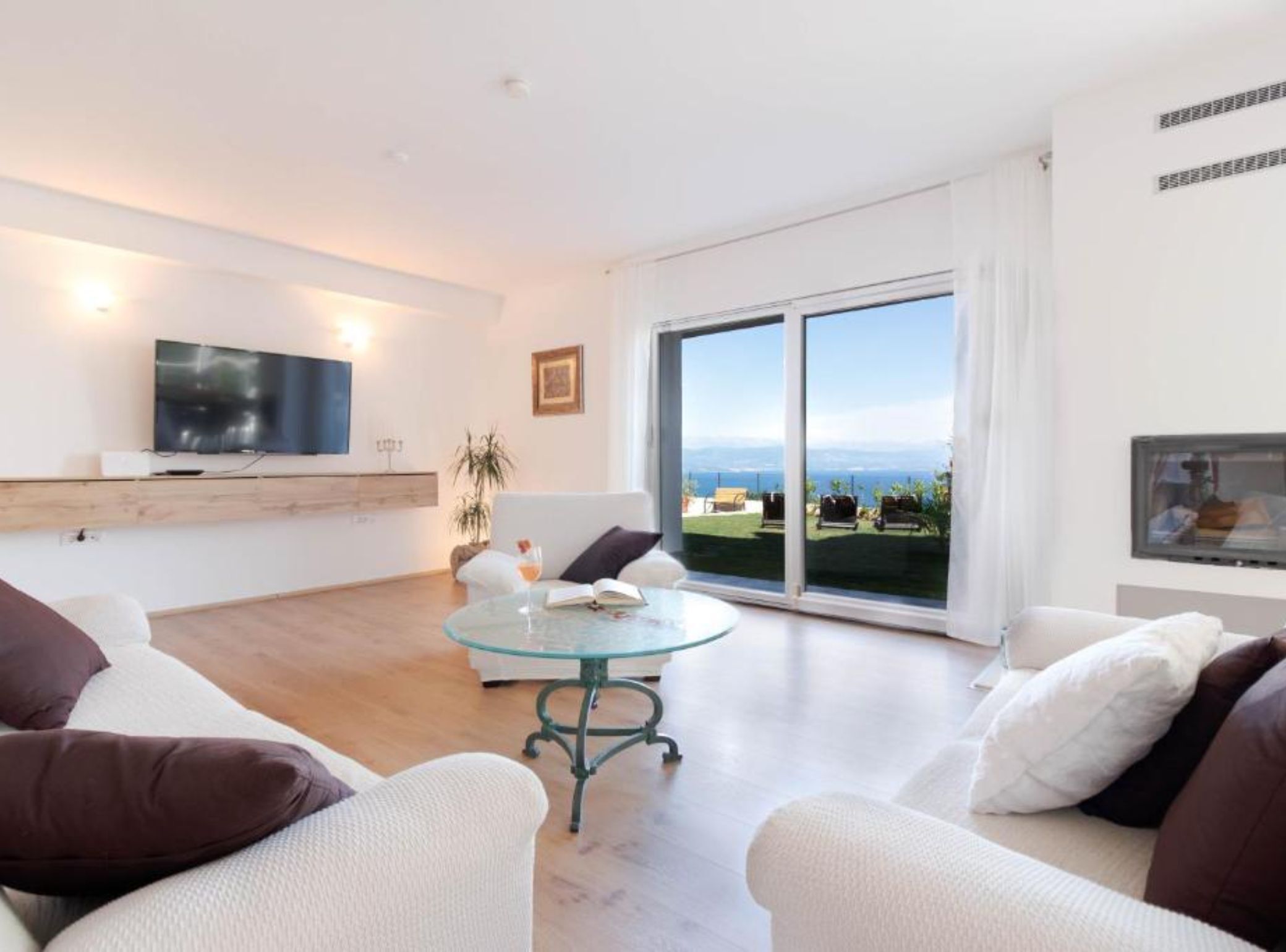 Villa (Three Bedroom Villa with Sea View) | Living room | 32-inch flat-screen TV with satellite channels