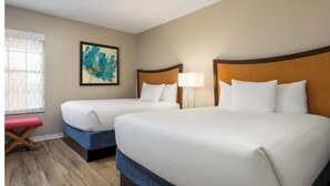 A hotel room with two beds, a bench, a painting, and a window with curtains. - 2 bedroom condo at Holiday Inn Vacation Club Orange Lake Resort in Kissimmee, FL (Kissimmee)