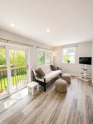 Living area - Northern Nest Studio with Patio and BBQ (Markdale)
