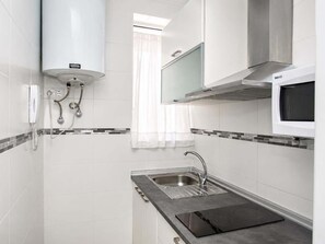 Fridge, microwave, coffee/tea maker, toaster