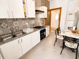Apartamento, 2 quartos, sacada, vista para o jardim | Parte interna