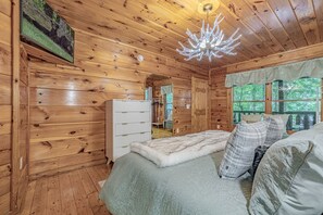 1 bedroom, iron/ironing board, WiFi, bed sheets - Cozy Smoky Mountain Cabin Escape • Hot Tub, Sauna & Mountain Views near Sevierville, Tennessee (Sevierville)