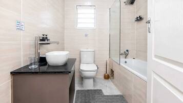 Hair dryer, towels, soap, shampoo