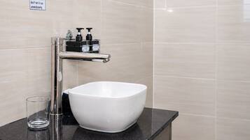 Hair dryer, towels, soap, shampoo