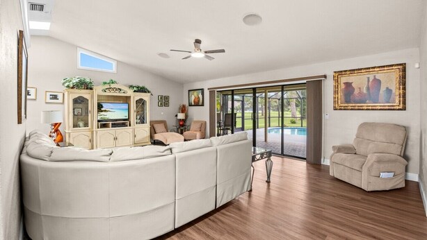 Living area - Lakewood Park Golf View Home w Pool & Lanai (Fort Pierce)