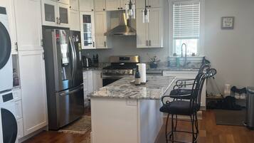 Coffee/tea maker, fridge, microwave, oven