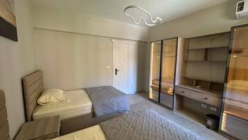 2 dormitorios, tabla de planchar con plancha, wifi y ropa de cama