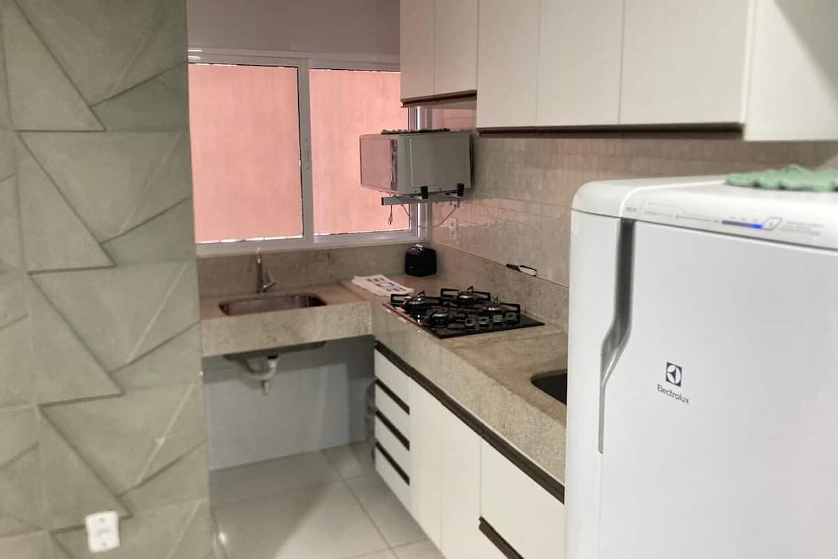 Habitación triple | Cocina privada | Licuadora, plancha y utensilios de cocina